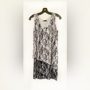 Melis Kogan chic abstract black and white dress